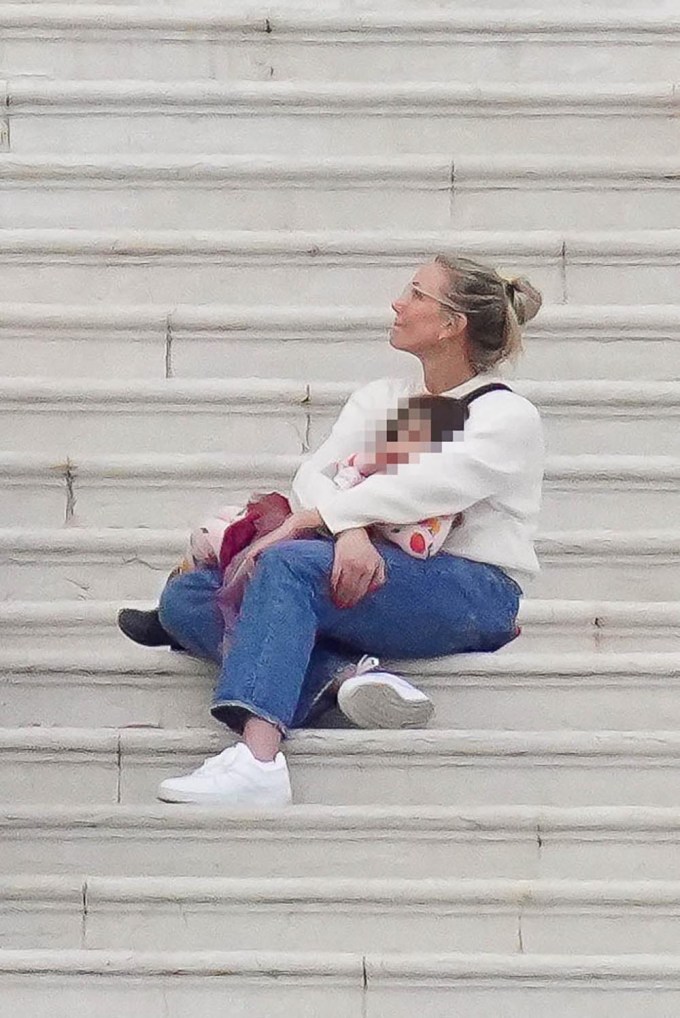 Cameron Diaz and her daughter snuggle