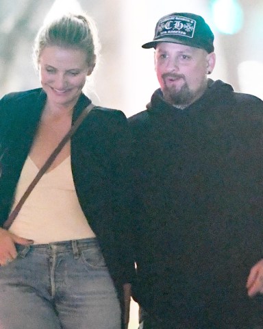 EXCLUSIVE: Cameron Diaz & hubby Benji Madden make a rare public appearance as they wait around for a table at Sugarfish sushi in Beverly Hills. 11 Jul 2019 Pictured: Cameron Diaz, Benji Madden. Photo credit: MEGA TheMegaAgency.com +1 888 505 6342 (Mega Agency TagID: MEGA464459_005.jpg) [Photo via Mega Agency]