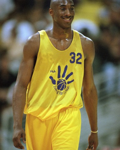 Newly-acquired Los Angeles Laker Kobe Bryant walks downcourt during a summer league game against the Detroit Pistons in Long Beach, Calif., on
Kobe Bryant, Long Beach, USA