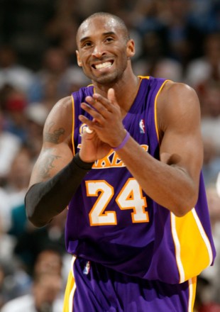 Kobe Bryant Los Angeles Lakers' guard Kobe Bryant celebrates three points against the Denver Nuggets in the third inning of game 4 of the teams' Western Conference semifinal basketball game in Denver,.  Lakers beat Nuggets 107-101 to wipe out Lakers Nuggets Basketball series, Denver, USA