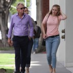 EXCLUSIVE: Former Wheel of Fortune host Pat Sajak feeds a parking meter to shop with wife Lesley and daughter Maggie