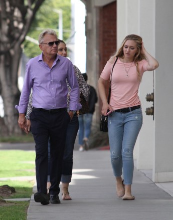 EXCLUSIVE: Former Wheel of Fortune host Pat Sajak feeds a parking meter to shop with wife Lesley and daughter Maggie. The 70-year-old TV host looked fit as she stepped out in West Hollywood, CA. 25 Apr 2017 Pictured: Pat Sajak. Photo credit: APEX / MEGA TheMegaAgency.com +1 888 505 6342 (Mega Agency TagID: MEGA31636_006.jpg) [Photo via Mega Agency]