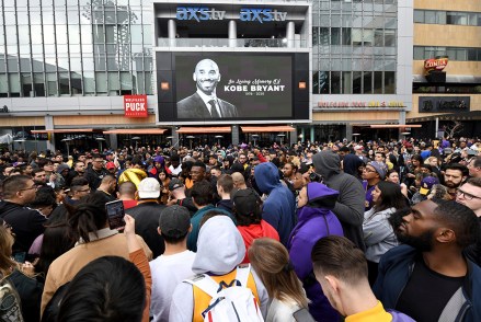 People gather outside Staples Center after the death of Laker legend Kobe Bryant, in Los Angeles
Obit Bryant Basketball, Los Angeles, USA - 26 Jan 2020