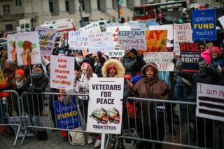 People take part in a rally before the Women's March, on in New York. Hundred showed up in New York City and thousands in Washington, D.C. for the rallies, which aim to harness the political power of women, although crowds were noticeably smaller than in previous years. Marches were scheduled Saturday in more than 180 citiesWomen's Marches, New York, USA - 18 Jan 2020