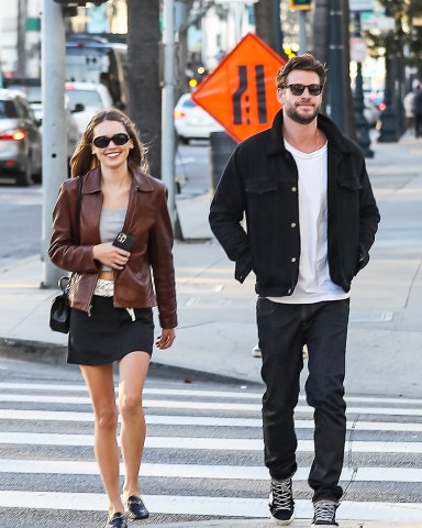 Beverly Hills, CA  - *EXCLUSIVE*  - Actor Liam Hemsworth and girlfriend Gabriella Brooks go on shopping spree on Rodeo drive and Saks Fifth Ave store in Beverly Hills. They were previously spotted having lunch at Gracias Madre, the restaurant Liam dined at with ex Miley Cyrus before.Pictured: Gabriella Brooks, Liam HemsworthBACKGRID USA 28 JANUARY 2023 USA: +1 310 798 9111 / usasales@backgrid.comUK: +44 208 344 2007 / uksales@backgrid.com*UK Clients - Pictures Containing ChildrenPlease Pixelate Face Prior To Publication*