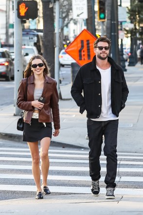 Beverly Hills, CA  - *EXCLUSIVE*  - Actor Liam Hemsworth and girlfriend Gabriella Brooks go on shopping spree on Rodeo drive and Saks Fifth Ave store in Beverly Hills. They were previously spotted having lunch at Gracias Madre, the restaurant Liam dined at with ex Miley Cyrus before.Pictured: Gabriella Brooks, Liam HemsworthBACKGRID USA 28 JANUARY 2023 USA: +1 310 798 9111 / usasales@backgrid.comUK: +44 208 344 2007 / uksales@backgrid.com*UK Clients - Pictures Containing ChildrenPlease Pixelate Face Prior To Publication*