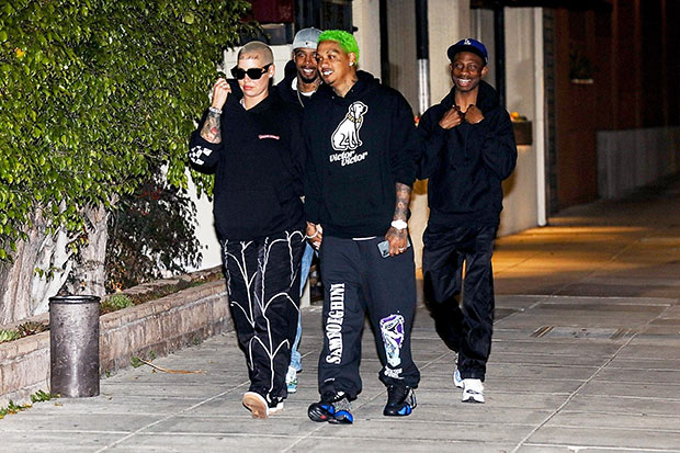 Amber Rose & A.E. holding hands while out to dinner 