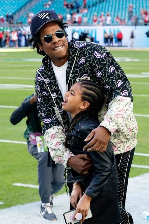 Entertainer Jay-Z embraces his daughter Blue Ivy Carter as they arrive for the NFL Super Bowl 54 football game between the San Francisco 49ers and the Kansas City Chiefs, in Miami
49ers Chiefs Super Bowl Football, Miami Gardens, USA - 02 Feb 2020
