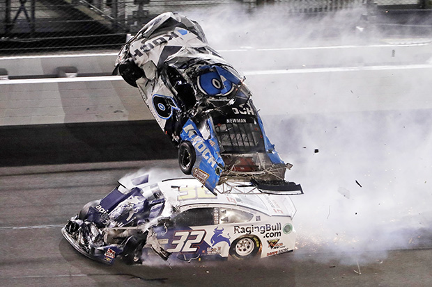 Ryan Newman (6) goes airborne after crashing with Corey LaJoie (32) during the NASCAR Daytona 500 auto race Monday, Feb. 17, 2020, at Daytona International Speedway in Daytona Beach, Fla. (AP Photo/Chris O'Meara)