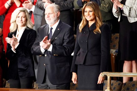 First Lady Melania Trump arrives before President Donald Trump delivers his State of the Union address to a joint session of Congress on Capitol Hill in Washington, Tuesday, Feb. 4, 2020. At center is Rush Linbaugh.(AP Photo/Patrick Semansky)