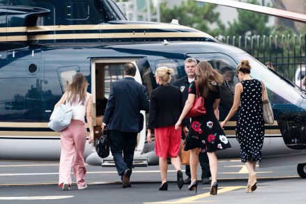 New York Gov. Andrew Cuomo and four women prepare to board a helicopter after announcing his resignation, in New York. Cuomo says he will resign over a barrage of sexual harassment allegations. The three-term Democratic governor's decision, which will take effect in two weeks, was announced Tuesday as momentum built in the Legislature to remove him by impeachment
Cuomo-Sexual-Harassment, New York, United States - 10 Aug 2021