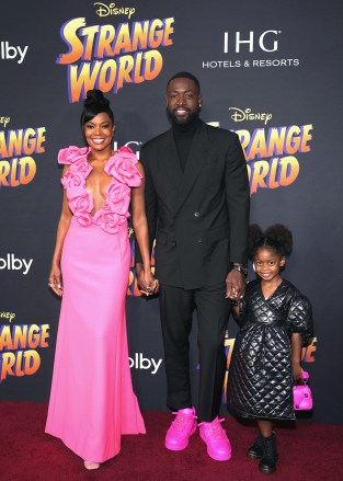 Gabrielle Union (L), American basketball player Dwyane Wade (C) and daughter Kaavia James Union Wade (R) attend the premiere of 'Strange World' at the El Capitan Theater in Los Angeles, California, United States, on 15 November 2022. 'Strange World' premiere in Los Angeles, USA - November 15, 2022