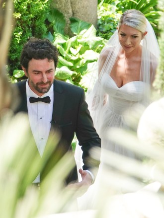 EXCLUSIVE: Stassi Schroeder surprises husband Beau Clark with her new wedding dress ahead of the second upcoming ceremony in Rome. 12 May 2022 Pictured: Stassi Schroeder; Beau Clark. Photo credit: ROMA/MEGA TheMegaAgency.com +1 888 505 6342 (Mega Agency TagID: MEGA856695_015.jpg) [Photo via Mega Agency]