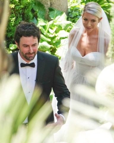 EXCLUSIVE: Stassi Schroeder surprises husband Beau Clark with her new wedding dress ahead of the second upcoming ceremony in Rome. 12 May 2022 Pictured: Stassi Schroeder; Beau Clark. Photo credit: ROMA/MEGA TheMegaAgency.com +1 888 505 6342 (Mega Agency TagID: MEGA856695_015.jpg) [Photo via Mega Agency]