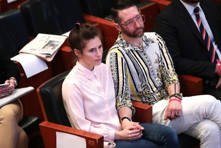 Amanda Knox (L) and her boyfriend Christopher Robinson (R) attend the conference of the Criminal Justice Festival at the University of Modena
Amanda Knox visit to Italy - 14 Jun 2019
Knox, who was acquitted on appeal in 2011 of murdering her British flatmate Meredith Kercher in Perugia after a long legal battle and almost four years in jail, is in Modena where she takes part in an event at the Criminal Justice Festival.