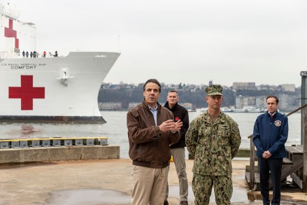 New York Gov. Andrew Cuomo speaks as the Navy Hospital Ship USNS Comfort arrives in Manhattan's Pier 90 to help relieve the strain on local hospitals with its 1,000 beds and 1,200 personnel during the Coronavirus (COVID-19) pandemic in New York City.
Coronavirus outbreak, New York, USA - 30 Mar 2020