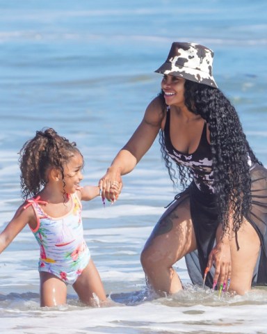 Malibu,   - *EXCLUSIVE*  - Blac Chyna enjoys a beach day with her daughter Dream in Malibu amid news she has landed a new role in "Secret Society 2."  Chyna was seen looking happier and more carefree  than she has been seen in a long time kicking back with her little girl on the beach.Pictured: Blac ChynaBACKGRID USA 25 JUNE 2022 USA: +1 310 798 9111 / usasales@backgrid.comUK: +44 208 344 2007 / uksales@backgrid.com*UK Clients - Pictures Containing ChildrenPlease Pixelate Face Prior To Publication*