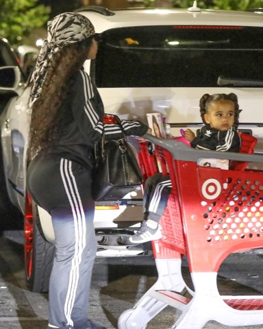 Hollywood, CA  - *EXCLUSIVE*  - Blac Chyna is out with baby Dream at Target in Hollywood spending some quality time with the adorable child she shares with Rob Kardashian. Chyna and  Dream wore matching tracksuits and sneakers for the outing. Chyna carried her little girl and placed her inside the shopping cart as they make their way inside the retailer.  Pictured: Blac Chyna, Dream Kardashian   BACKGRID USA 23 AUGUST 2019   BYLINE MUST READ: JACK / BACKGRID  USA: +1 310 798 9111 / usasales@backgrid.com  UK: +44 208 344 2007 / uksales@backgrid.com  *UK Clients - Pictures Containing Children Please Pixelate Face Prior To Publication*