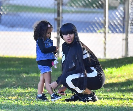 EXCLUSIVE: Blac Chyna takes her daughter Dream Kardashian to support her little brother King at his soccer game in Woodland Hills.  Blac was seen arriving and spending time with a mystery man as she stood on the sidelines with the other parents.  Dream Kardashian was seen having a great time running around and at one point she had a phone on her hand and she typed 911 on the calculator key pad.  ** SPECIAL INSTRUCTIONS *** Please pixelate children's faces before publication. **.  06 Oct 2019 Pictured: Blac Chyna, Dream Kardashian, King Stevenson.  Photo credit: Marksman / MEGA TheMegaAgency.com +1 888 505 6342 (Mega Agency TagID: MEGA522163_001.jpg) [Photo via Mega Agency]