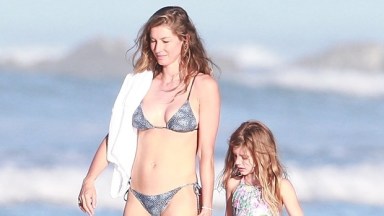 Gisele Bundche on the beach with her daughter