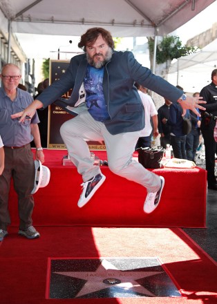 US actor Jack Black jumps up during a ceremony honoring him with a star on the Hollywood Walk of Fame in Hollywood, California, USA, 18 September 2018. Black  received the 2,645th star in the category of Motion Pictures.
US actor Jack Black is honor with a star on the Hollywood Walk of Fame, USA - 18 Sep 2018