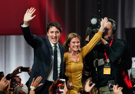 Liberal leader Justin Trudeau and wife Sophie Gregoire Trudeau wave as they go on stage at Liberal election headquarters in Montreal
Canada Election Liberals - 21 Oct 2019