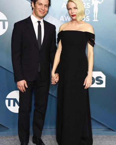 Thomas Kail, Michelle Williams. Thomas Kail, left, and Michelle Williams arrive at the 26th annual Screen Actors Guild Awards at the Shrine Auditorium & Expo Hall, in Los Angeles
26th Annual SAG Awards - Arrivals, Los Angeles, USA - 19 Jan 2020