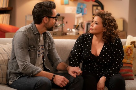 (L-R): Todd Grinnell as Schneider and Justina Machado as Penelope in ONE DAY AT A TIME.  Photo Credit: Nicole Wilder/POP TV.