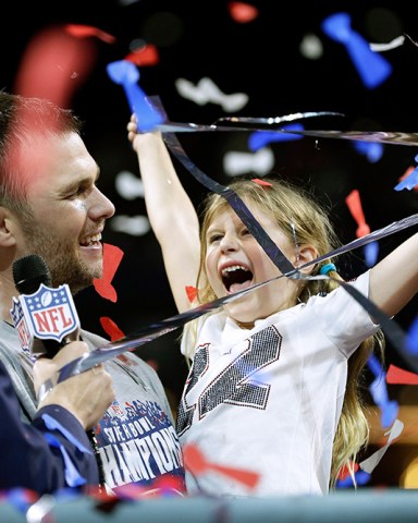 New England Patriots' Tom Brady celebrates with his daughter, Vivian, after the NFL Super Bowl 53 football game against the Los Angeles Rams, in Atlanta. The Patriots won 13-3 Patriots Rams Super Bowl Football, Atlanta, USA - 03 Feb 2019