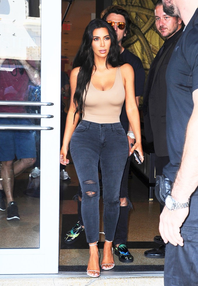 Kim Kardashian In Ripped Jeans & Bodysuit