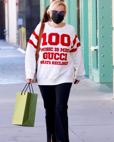 Beverly Hills, CA - *EXCLUSIVE* - Aussie star Rebel Wilson is pictured wearing a Gucci 100 white sweatshirt with black trousers and leather shoes as she gets her shopping on at the Gucci storePictured: Rebel WilsonBACKGRID USA 19 OCTOBER 2021 BYLINE MUST READ: LESE / BACKGRIDUSA: +1 310 798 9111 / usasales@backgrid.comUK: +44 208 344 2007 / uksales@backgrid.com*UK Clients - Pictures Containing ChildrenPlease Pixelate Face Prior To Publication*