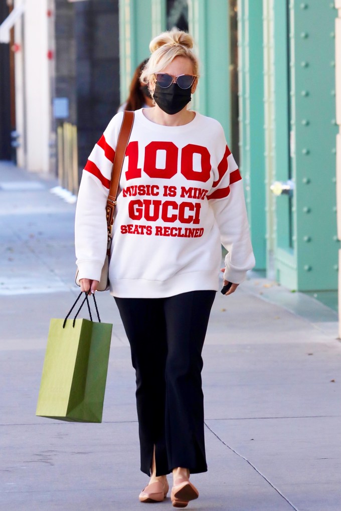 Rebel Wilson wears a Gucci sweatshirt
