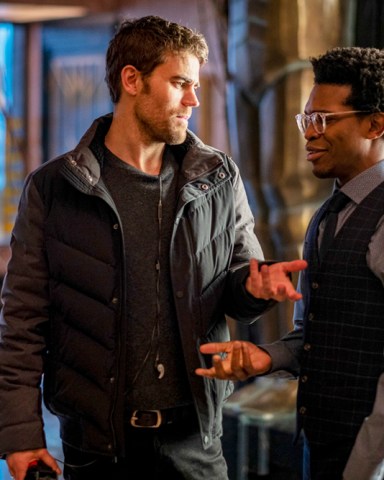 Batwoman -- "A Narrow Escape" -- Image Number: BWM117A_BTS_0501b -- Pictured: Paul Wesley and Camrus Johnson as Luke Fox -- Photo: Robert Falconer/The CW -- © 2020 The CW Network, LLC. All rights reserved.