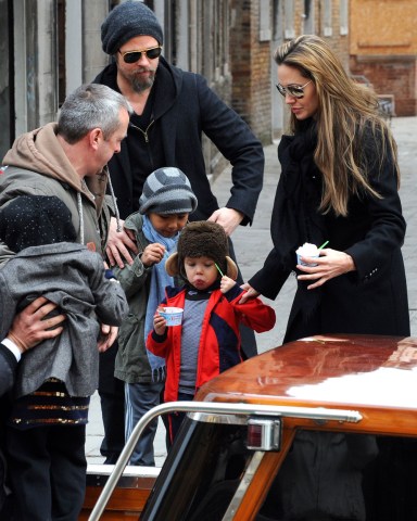 Actors Angelina Jolie, right, and Brad Pitt, second left,are seen with children Maddox, left, Shiloh Jolie-Pitt, in Venice,. Angelina Jolie is in Venice to shoot scenes of the movie "The Tourist", by director Florian Henckel von Donnersmarck Jolie Pitt, Venice, Italy - 16 Feb 2010