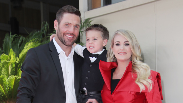 Carrie Underwood’s Hubby Mike Fisher Uses His Kids As Workout Weights 