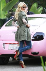 Paris Hilton and her pink Bentley Continental GT car
'The Simple Life' TV programme filming, Beverly Hills, Los Angeles, America - 18 Nov 2010
Paris Hilton in tight ripped jeans and leopard patterned high heels filming her reality show 'Simple Life' at Nicky Hilton's home.