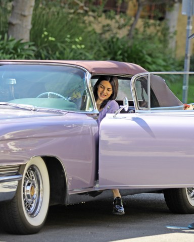 Kendall Jenner steps in to a mauve Cadillac Eldorado wearing a matching wool cardigan and a leather-chap/jean mix on a jaunt with friends in Los Angeles.
The model stepped out in her eclectic get-up carrying a plant with her security guard.

Jacket - Alessandra Rich Cropped Cardigan 
Top - Alessandra Rich Wool Bandeu 
Shoes - Miu Miu 
Necklace - Adƒ±na Jewels 
Earrings - Rachel Katz

Pictured: Kendall Jenner
Ref: SPL5077758 060419 NON-EXCLUSIVE
Picture by: SplashNews.com

Splash News and Pictures
USA: +1 310-525-5808
London: +44 (0)20 8126 1009
Berlin: +49 175 3764 166
photodesk@splashnews.com

World Rights, No Brazil Rights