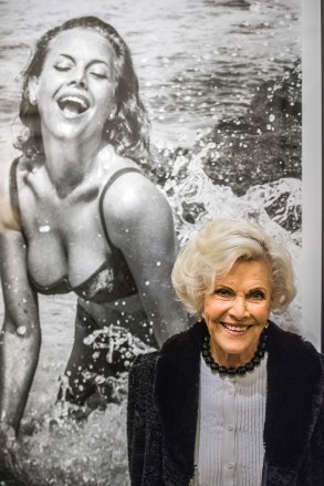 Honor Blackman in front of her photo as Pussy Galore
Terry o'Neill 'Bond and Beyond' book launch, Ransom Gallery Pimlico, London, Britain - 26 Nov 2015
BOND AND BEYOND  - exhibition of Bond -related photographs  and new digital covered  book by Terry 0'Neill, at Ransom Gallery Pimlico.  Ransom Gallery describe their concept as a 'Bond book for the 21st century.  In a first of its kind, there is a digital tablet with photographs built into the book cover, revealing all the images electronically.' Terry O'Neill took his Leica, Hasselblad and Nikon cameras to Bond film sets, revealing intimate glimpses of filming behind the scenes, from the 1960s to the p day, from Sean Connery to Roger Moore, Pierce Brosnan and Daniel Craig. He has always been a superb photographer of women, the book features Bond babes such as Ursula Andress, Honor Blackman and Joanna Lumley.