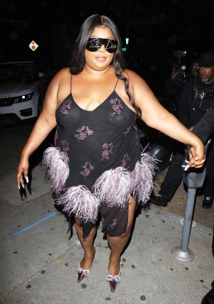 Singer, Lizzo seen arriving to celebrate her 35th birthday on a party bus with friends at Craigs restaurant in West Hollywood.  26 April 2022 Pictured: Lizzo.  Photo credit: MEGA TheMegaAgency.com +1 888 505 6342 (Mega Agency TagID: MEGA851693_002.jpg) [Photo via Mega Agency]