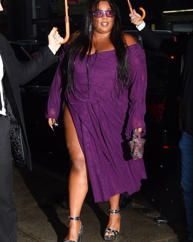 New York, NY  - Lizzo rocks a purple dress with matching sunglasses as she arrives at Anna Wintour's pre-Met gala dinner party.Pictured: LizzoBACKGRID USA 30 APRIL 2023 USA: +1 310 798 9111 / usasales@backgrid.comUK: +44 208 344 2007 / uksales@backgrid.com*UK Clients - Pictures Containing ChildrenPlease Pixelate Face Prior To Publication*