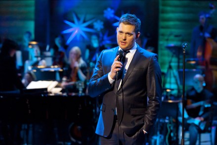 Editorial use onlyMandatory Credit: Photo by ITV/Shutterstock (1536483m)Michael Buble'Michael Buble - Home for Christmas' TV Programme - Dec 2011The Grammy award winning singer songwriter will be sprinkling his unique blend of extraordinary talent and infectious humour in this one off Christmas Special.  Headlining this exciting new show, Michael will be unwrapping a host of celebrity guests including X Factor judge Gary Barlow and comedienne Dawn French who will be joining the show's festivities, which will see some unmissable duets, including an exclusive performance with The X Factor's Kelly Rowland.  Michael and Kelly will join forces for the first time to sing one of the country's best loved Christmas hits.        Following the success of his previous ITV shows, An Audience With and This Is Michael Bublé, the critically acclaimed performer will be recreating his own Canadian luxurious winter retreat here in the UK.  Having sold an estimated 30 million albums, the singer will be performing classic seasonal hits from his new album 'Christmas' as well other favourites.   Other guests include Naturally 7, The Puppini Sisters and Gino D'Acampo