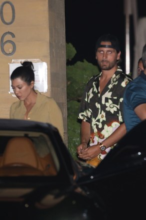 Kourtney Kardashian and Scott Disick have a romantic dinner date at Nobu Malibu in Malibu. The duo arrived at 9 P.M. for dinner and left around 10:30 P.M. Sofia Richie was also having dinner at Nobu but she left 5 minutes before Kourtney and Scott arrived. 28 Aug 2020 Pictured: Kourtney Kardashian and Scott Disick. Photo credit: Photographer Group/MEGA TheMegaAgency.com +1 888 505 6342 (Mega Agency TagID: MEGA697118_012.jpg) [Photo via Mega Agency]
