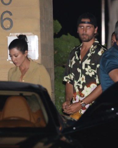 Kourtney Kardashian and Scott Disick have a romantic dinner date at Nobu Malibu in Malibu. The duo arrived at 9 P.M. for dinner and left around 10:30 P.M. Sofia Richie was also having dinner at Nobu but she left 5 minutes before Kourtney and Scott arrived. 28 Aug 2020 Pictured: Kourtney Kardashian and Scott Disick. Photo credit: Photographer Group/MEGA TheMegaAgency.com +1 888 505 6342 (Mega Agency TagID: MEGA697118_012.jpg) [Photo via Mega Agency]