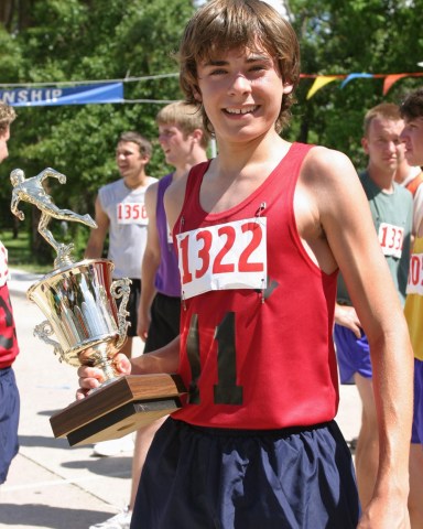 Editorial use only Mandatory Credit: Photo by ITV/Shutterstock (885411rb) 'Miracle Run'  TV Film -  The Unexpected Journey - Steven Morgan (Zac Efron) carries his trophy. GTV ARCHIVE