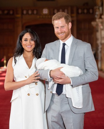 Prince Harry and Meghan Duchess of Sussex with their baby son during a photocall in St George's Hall at Windsor Castle in Berkshire
Prince Harry and Meghan Duchess of Sussex new Baby Photocall, Windsor Castle, UK - 08 May 2019