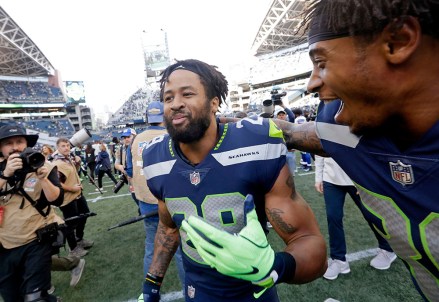 Seattle Seahawks free safety Earl Thomas, left, and defensive back Bradley McDougald, right, react after the Seahawks beat the Dallas Cowboys 24-13 in an NFL football game, in Seattle
Cowboys Seahawks Football, Seattle, USA - 23 Sep 2018