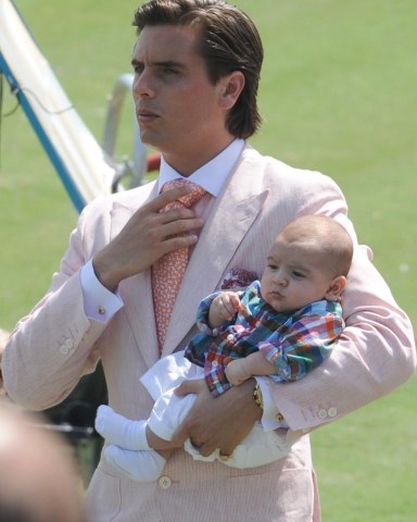 West Palm Beach Fl - March 14: (exclusive Coverage) Kourtney Kardashian and Scott Disick with Their Young Son Mason Dash Disick in Tow Take a Polo Lesson with Top Ranked American Polo Player Nic Roldan the Couple Was Joined by Sister Khloe Kardashian the Kardashian Clan Had a Great Afternoon Riding Horses and Joking Around While They Sipped Champagne at the International Polo Club Palm Beach On March 14 2010 in Wellington Florida People: Scott Disick_mason Dash Disick
The Kardashians Take a Polo Lesson at the International Polo Club Palm Beach - 14 Mar 2009