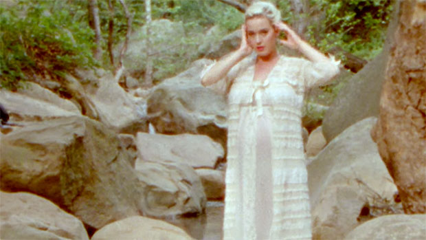 Katy Perry bares baby bump in new Daisies music video