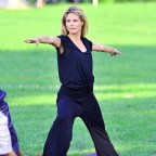 Heidi Klum keeps in shape by doing yoga with friend Russell Simmons in NYC