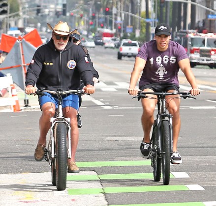Arnold Schwarzenegger rides a bike with his son Joseph Baena
Arnold Schwarzenegger out and about, Los Angeles, USA - 19 Jul 2020